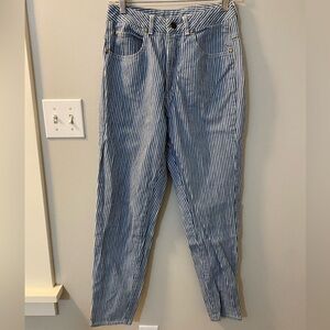 Vintage blue & white striped tapered jeans w/ zippers at the ankle. Size 6